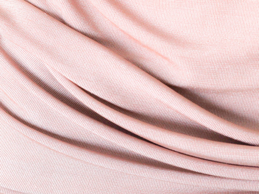 Primer plano de tela rosa